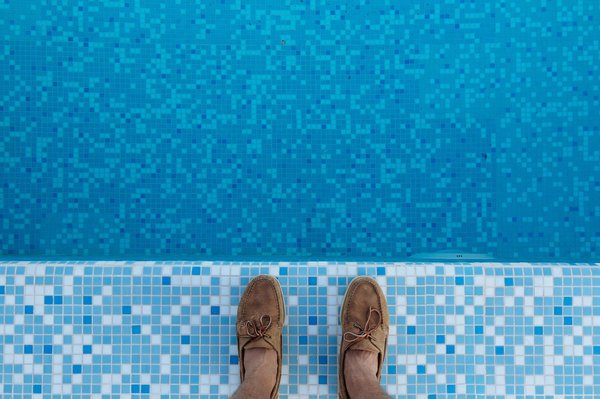 What are the critical considerations for installing a swimming pool in a home in Surrey?